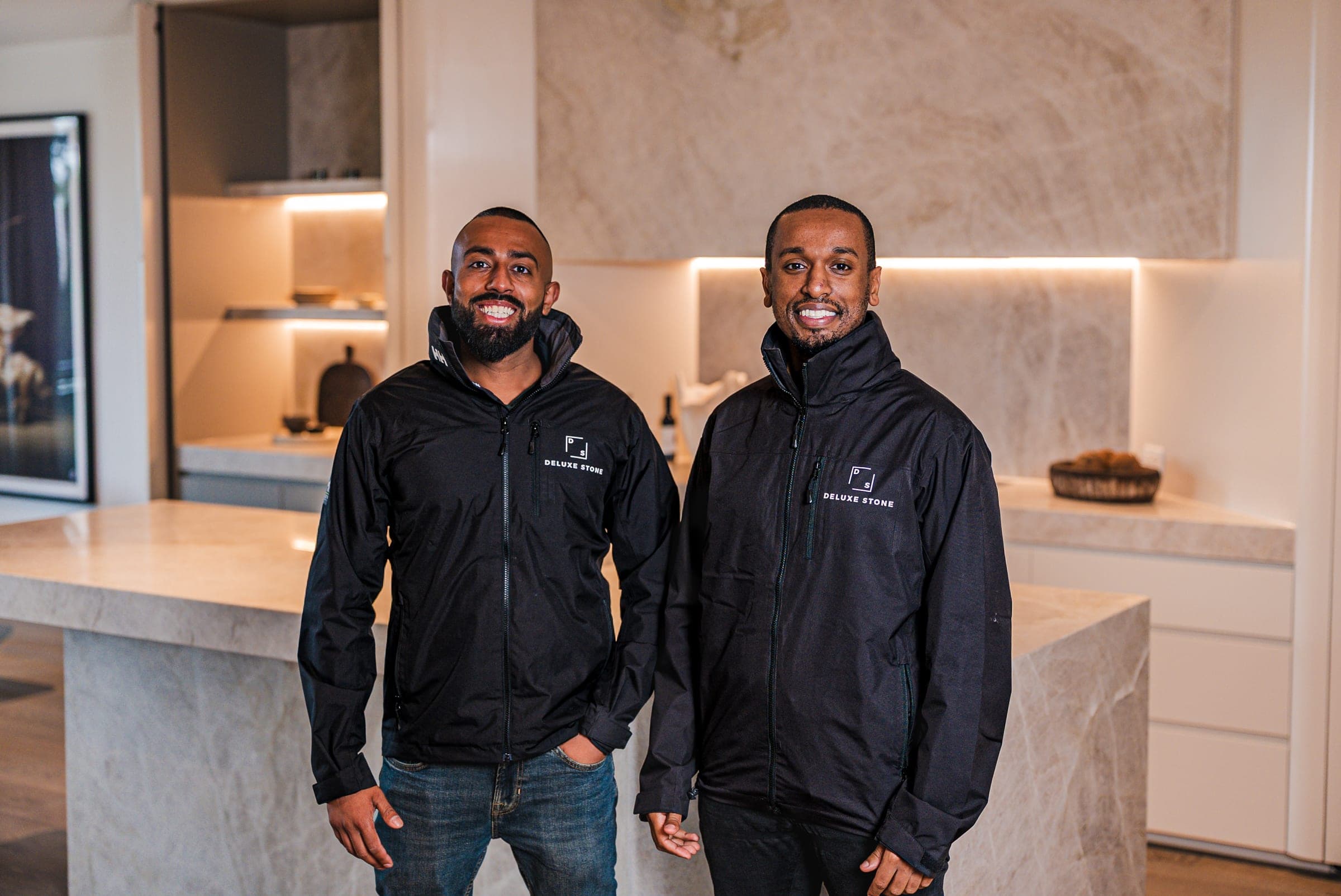 The directors of Deluxe Stone in the Brooklyn showroom